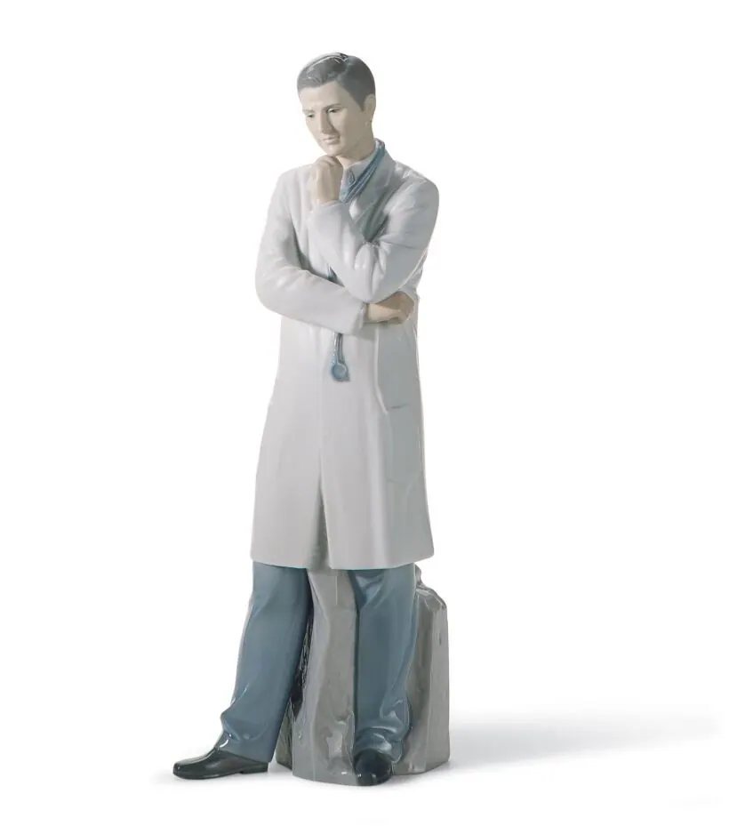 Lladró Male Doctor Figurine.
$390
Glossy porcelain doctor figurine with a stethoscope hanging from his neck and a white coat with blue trousers.
SKU 01008188