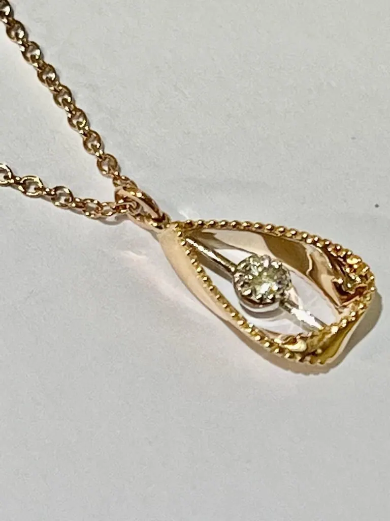 18W Rose Gold Italian Oro Trend Diamond Pendant on a 16-17 inches long 18 K Rose gold Chain with a Lobster Clasp